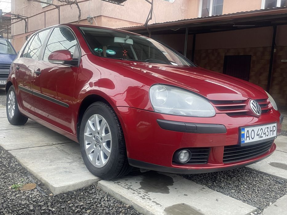 Volkswagen Golf . 1,4 mpi . 2003 рік. Червоний металік