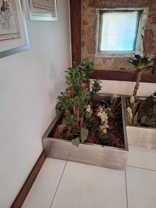 jardim interior  com bases inox