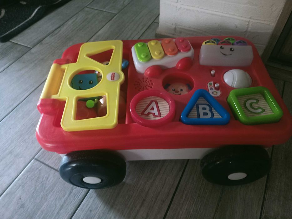 Fisher-Price edukacyjny wózek Szczeniaczek
