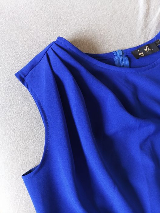 Zadbany granatowy kombinezon rozmiar S