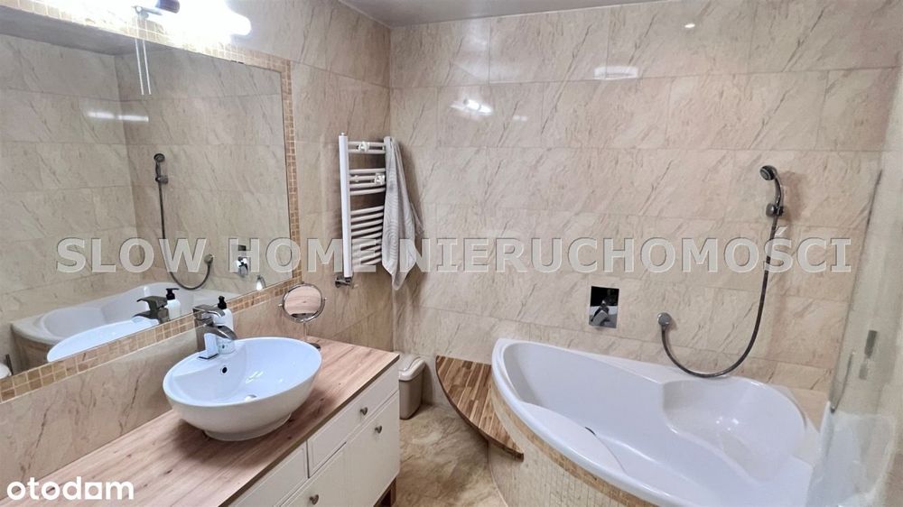 Apartament z garażem oraz biurem z ogródkiem