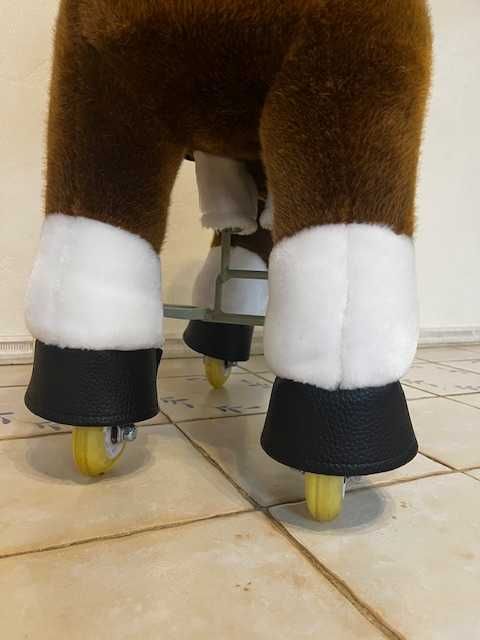 Детская лошадка с механическим приводом. PonyCycle Белое копытце.