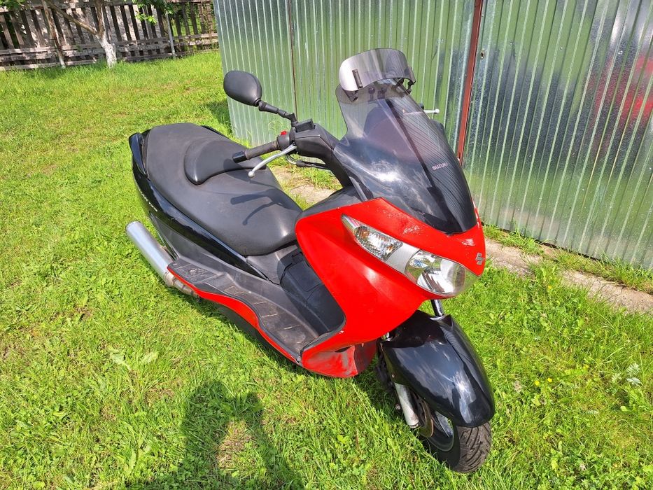Suzuki Burgman 125 k7 części owiewka lampa błotnik licznik koło plasti