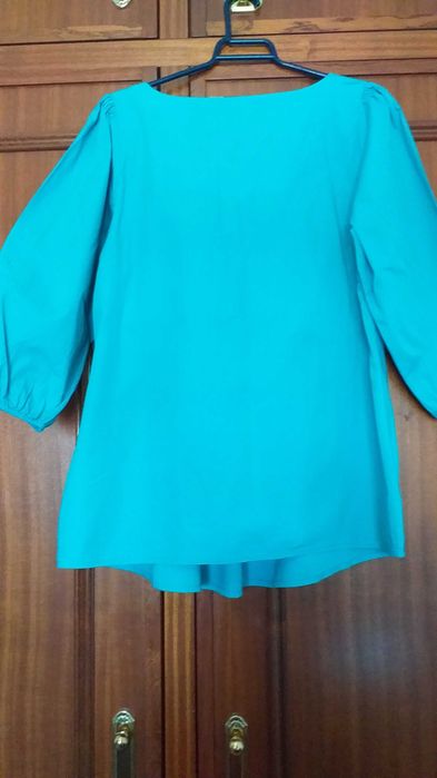 Blusa turquesa com manga