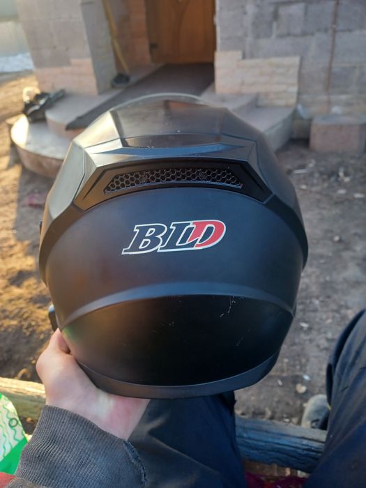 Мото шолом з апаратурою для прослуханя музики