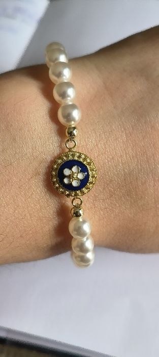 Pulseira pérolas com caramujo em prata