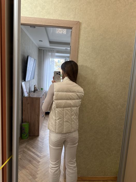 Жіноча осіння жилетка