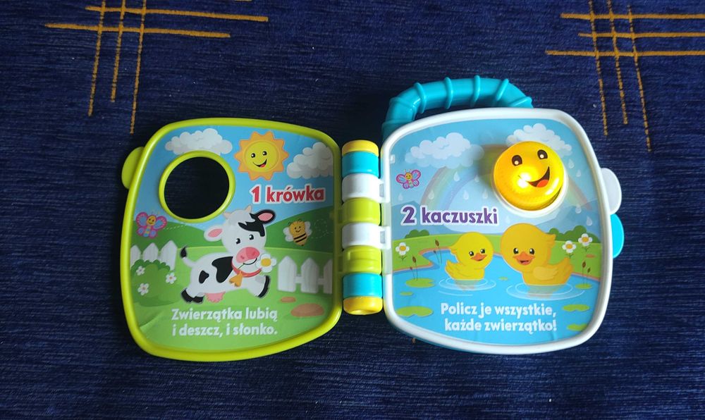 Zabawka interaktywna - książeczka / grająca / świecąca / mówiąca !