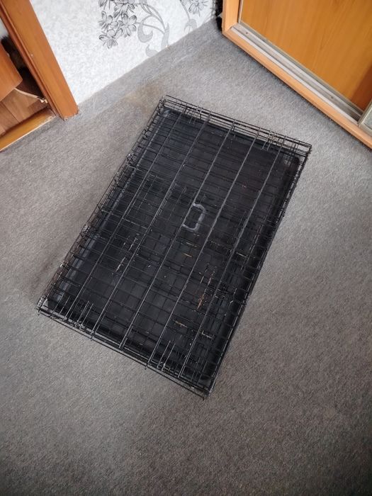 Металева клітка для транспортування тварин