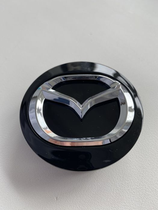 Колпачки в центр колеса Mazda 57мм/49мм (заглушки)