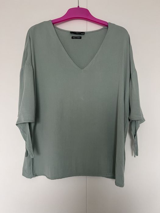 Zielona bluzka z wiązaniem