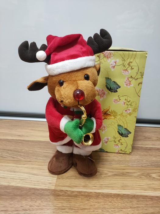 Продам музикальну іграшку новорічний Олень