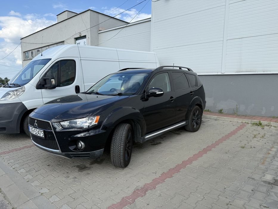 Салон outlander Xl новий