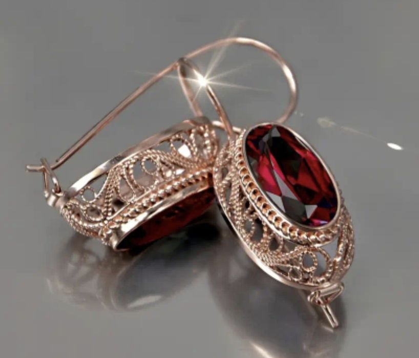 Kolczyki vintage z czerwonym oczkiem