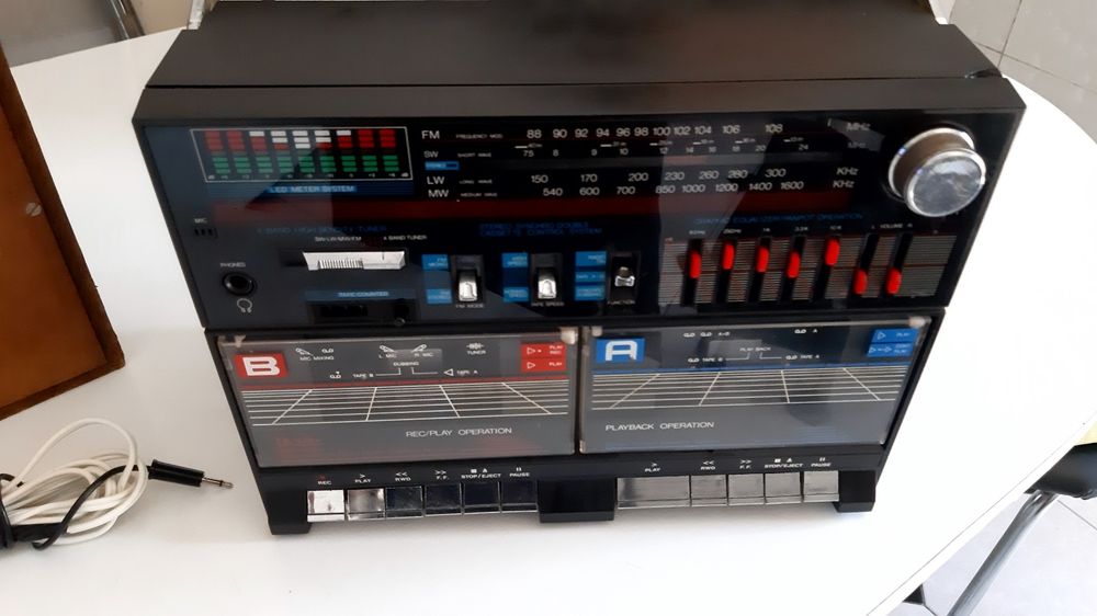 Leitor duplo com rádio