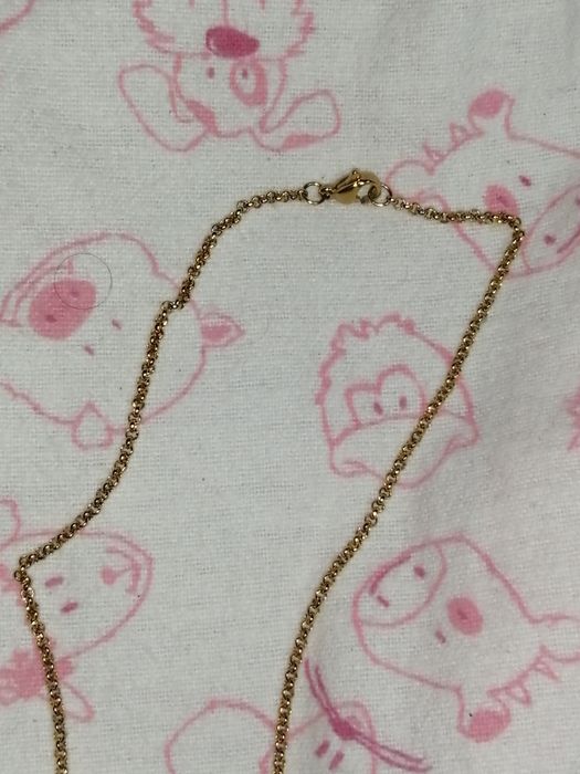 Fio dourado com palavra Mãe e Coracao