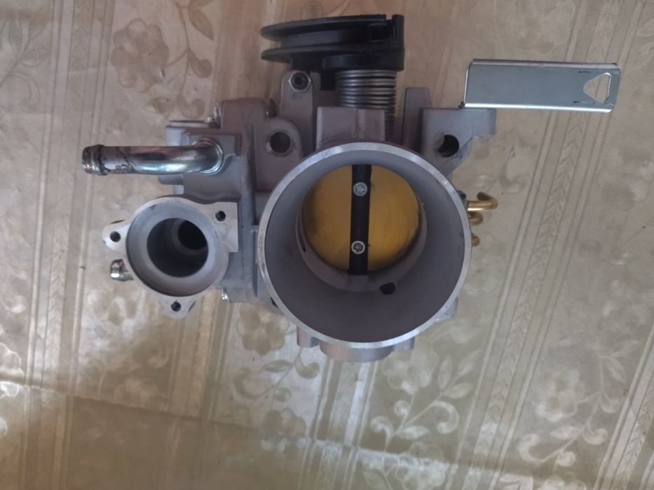 Дроссельная заслонка на Лансер 9