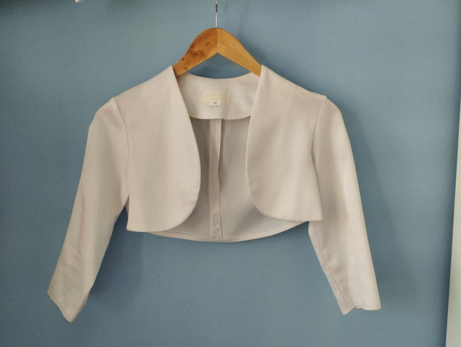 Białe bolerko dziewczęce