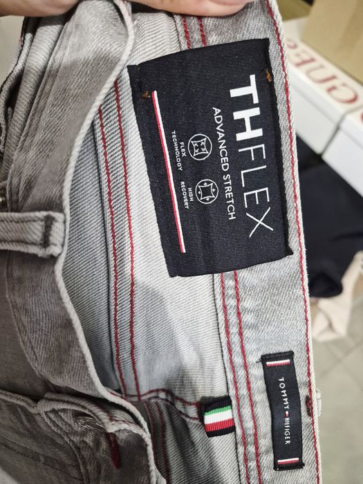 Meskie oryginalne spodnie Tommy Hilfiger roz 30/32 S szare