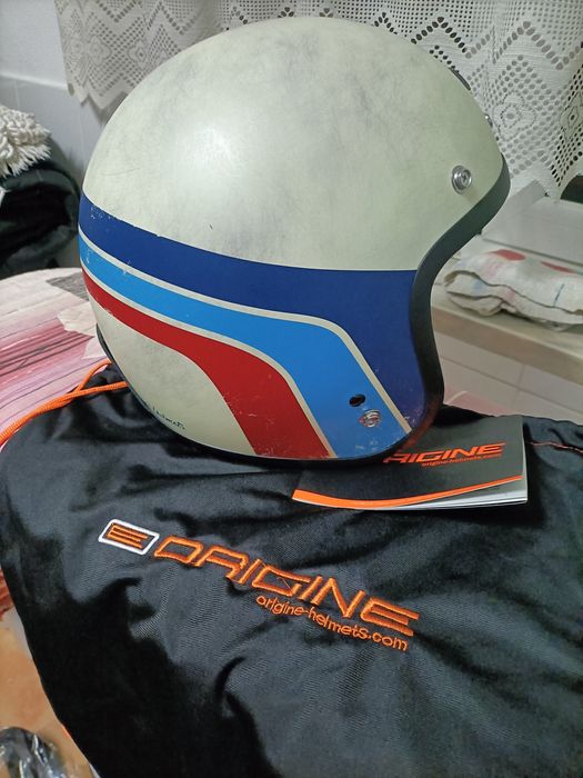 Capacete novo  E origine