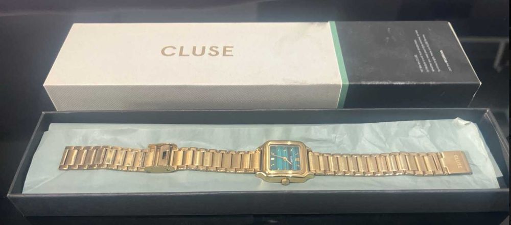 Relógio CLUSE dourado com mostrador azul/turquesa + caixa original