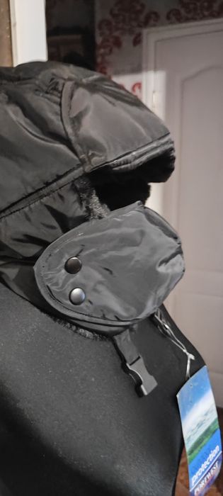 Теплі шапки-вушанки на зиму.