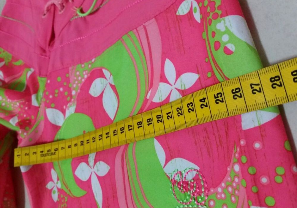 Calções marca Adidas para menina (12 anos)