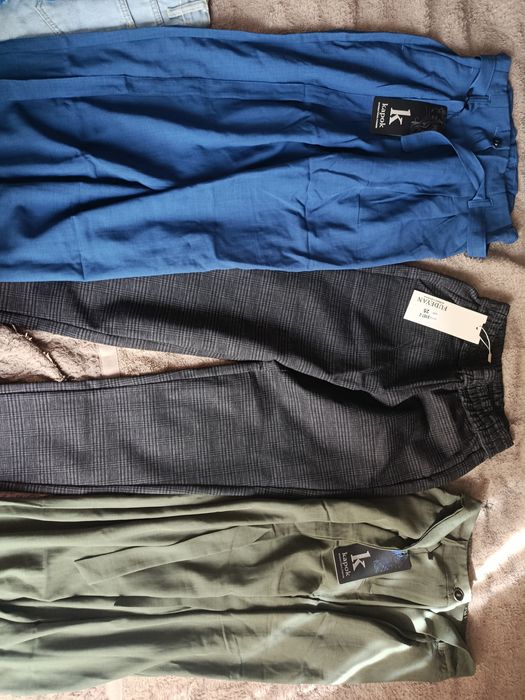 Штани на фото пише розмір нові