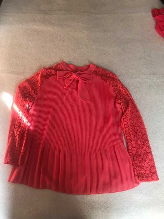 Blusa cor de rosa rendada