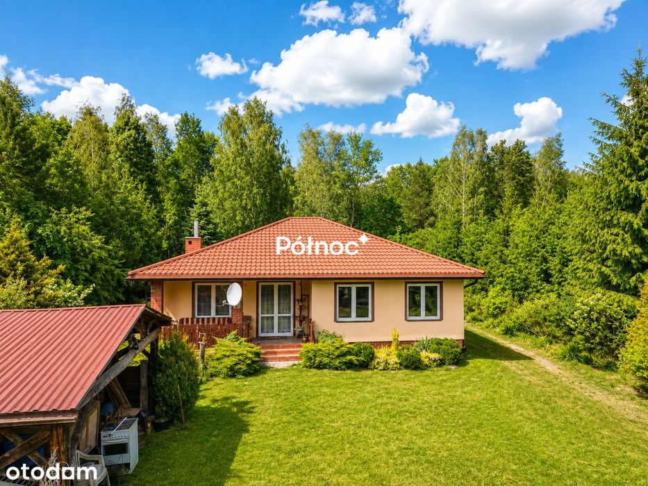 Dom z 35-arową działką i 3 garażami - Widok 3