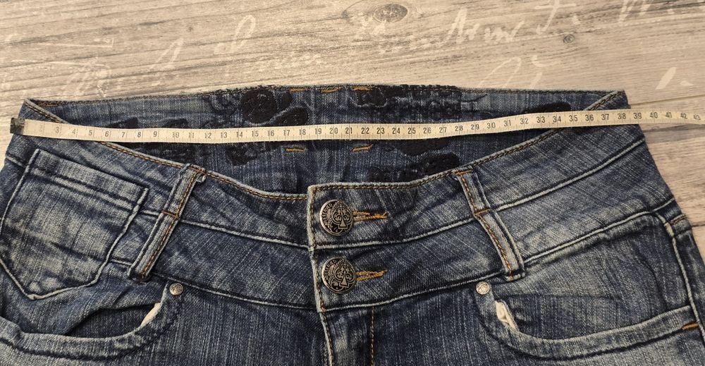 Spodnie jeansy Reserved 36