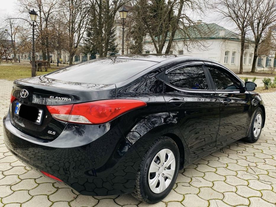 Hyundai Elantra 2013 год Газ/бензин