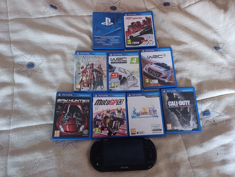 Tou a vender esta ps Vita com estes 9 jogos