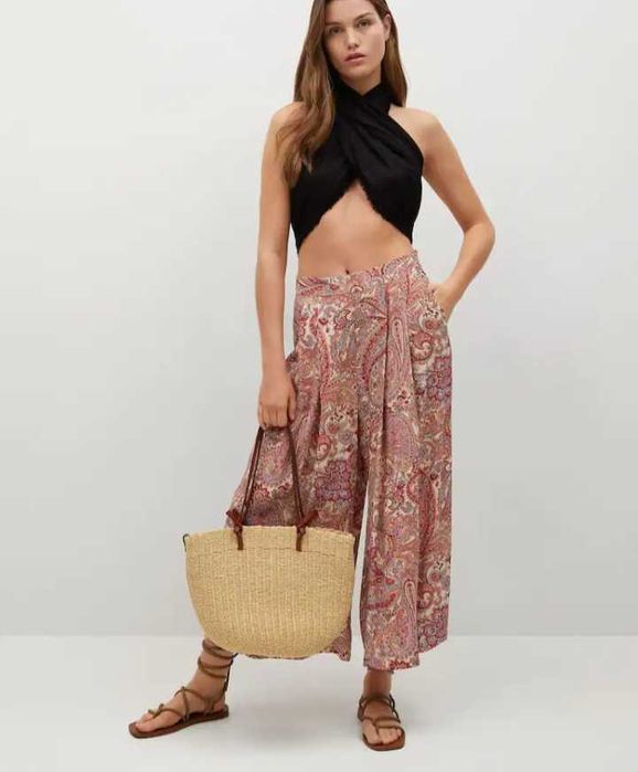 Calças fluidas Mango