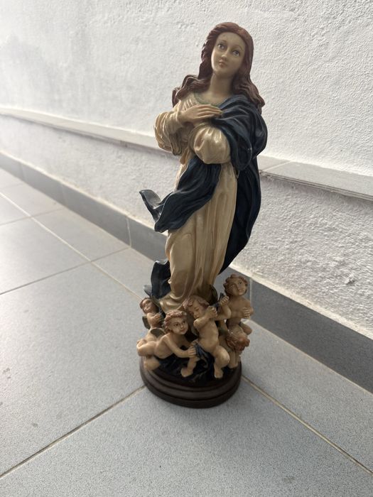 Santa com anjos, antiguidade