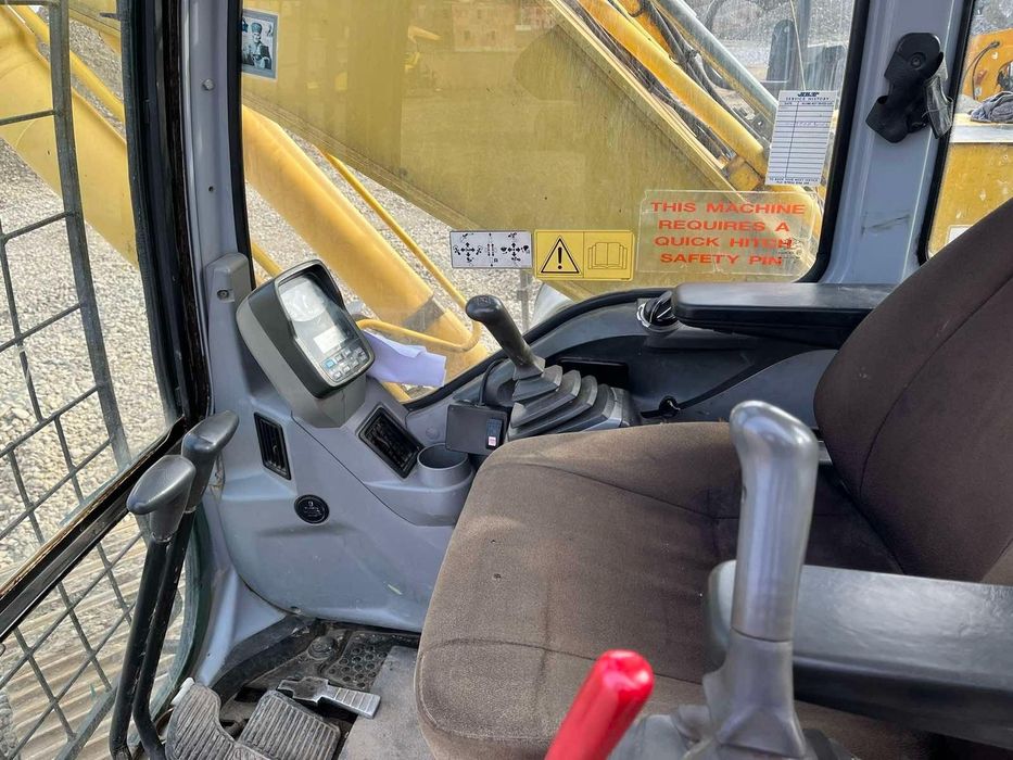 Екскаватор new holland