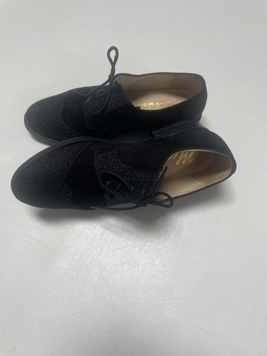 Sapatos classicos de cordão