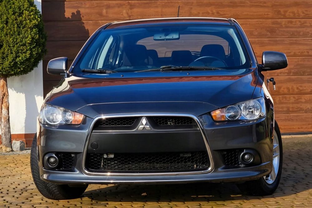 mitsubishi lancer viii sedan 2008-2015 chrom ramka grilla 6400b398 + śruby
