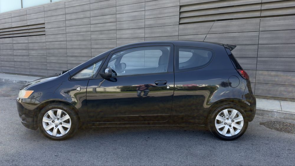Mitsubishi colt Ar condicionado