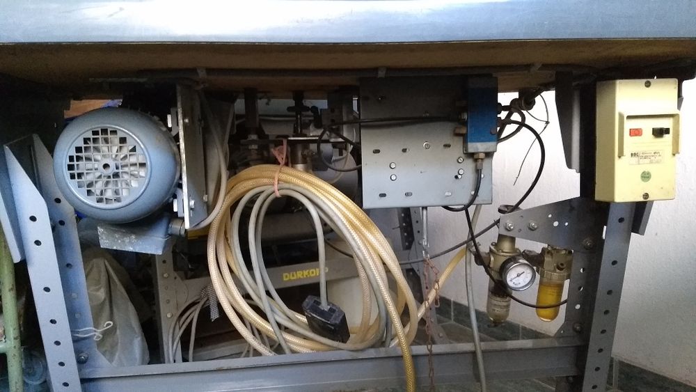 Máquina industrial pregar botões