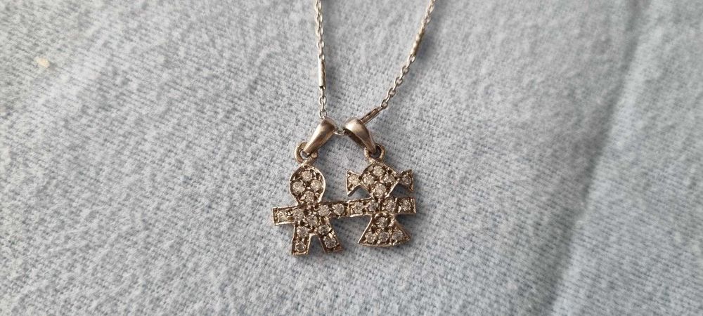 Fio prata com medalha