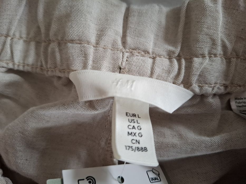 H&M Calça cargo creme perna larga - tamanho L
