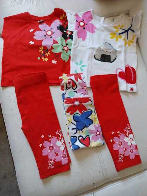 Pack de roupa da marca Tuc Tuc em tons de vermelho e azul