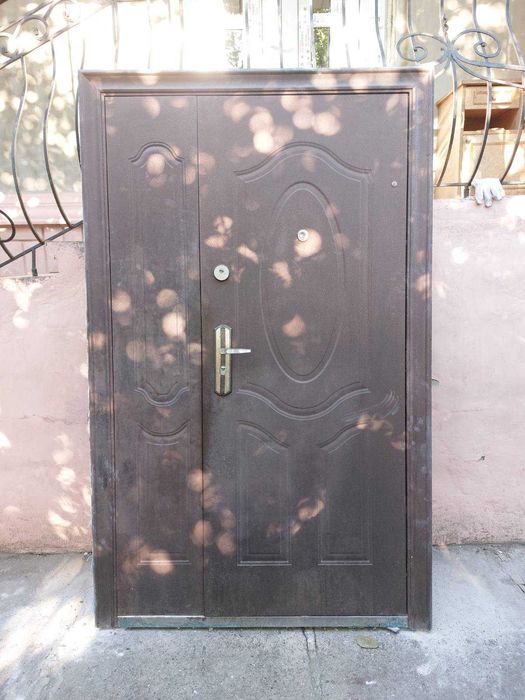 Двері вхідні металеві полуторні