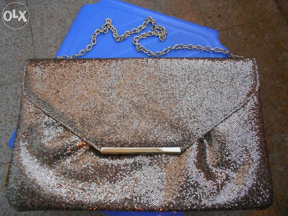 Despachar: Clutch Dourada AVON - nova
