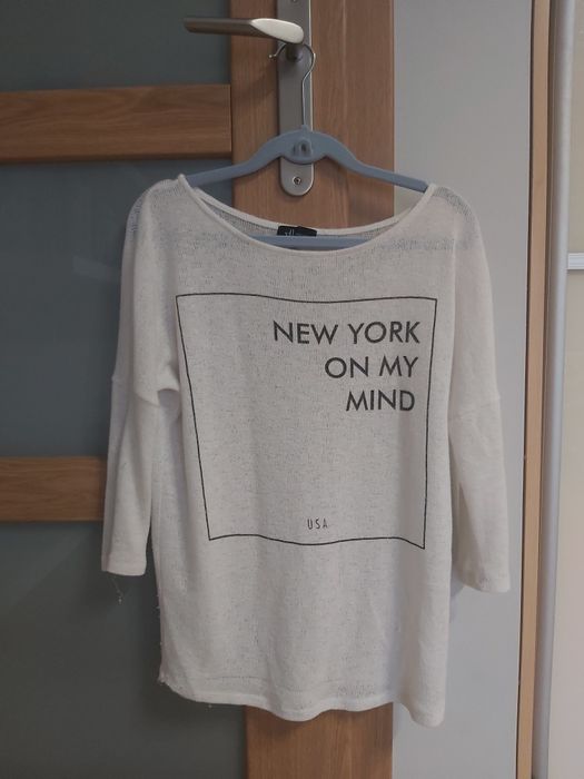 Biały sweterek oversize