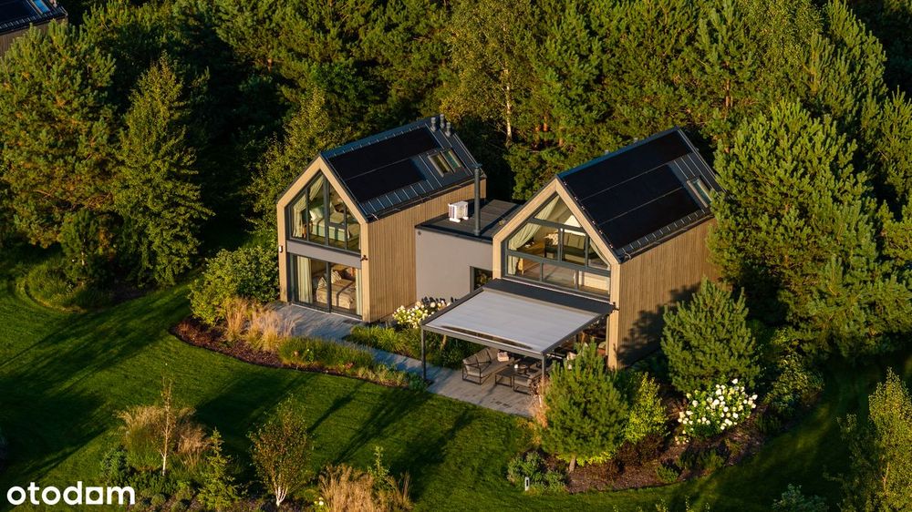 Dom wypoczynkowy z terenem rekreacyjnym, w okolicy lasów i jezior