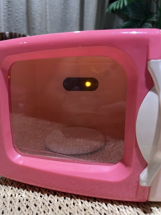 Microondas cor de rosa de brincar