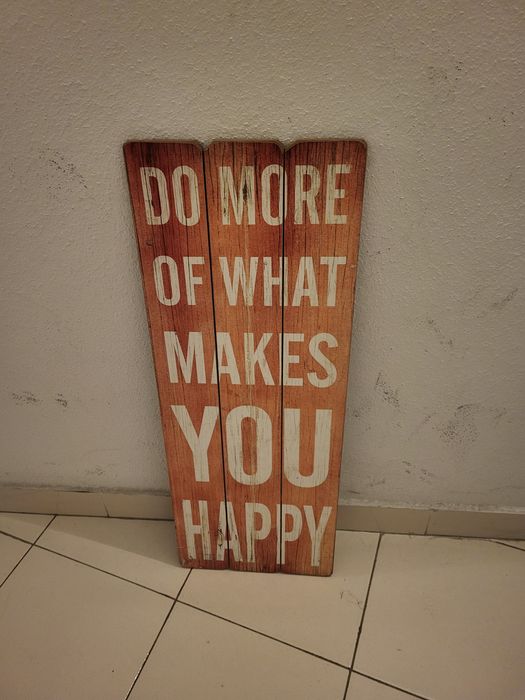 Decorative wooden sign.
