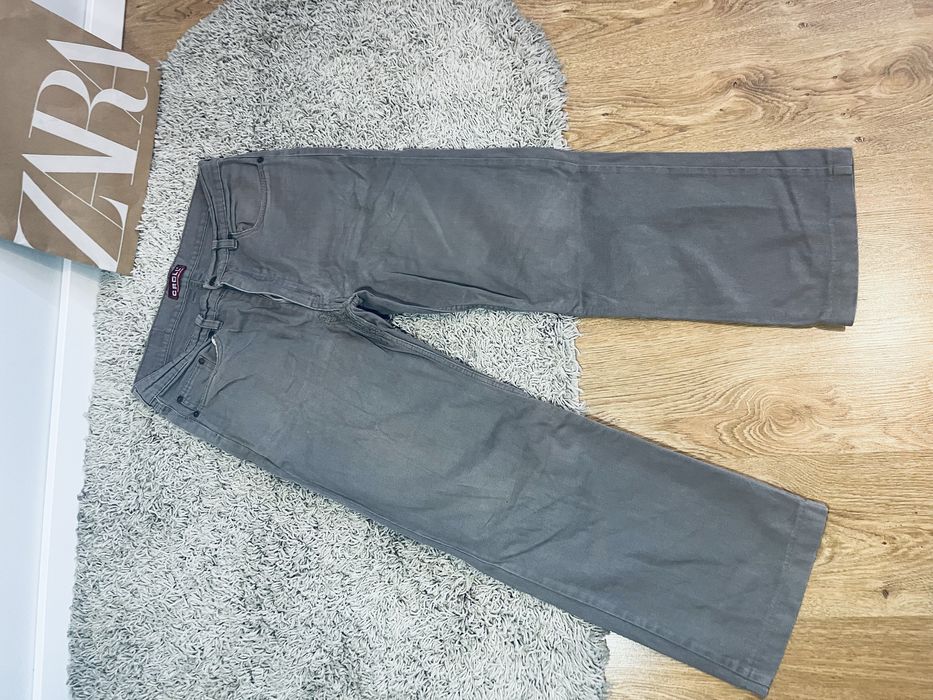 Brazowe meskie jeansy rozm M khaki szerokie